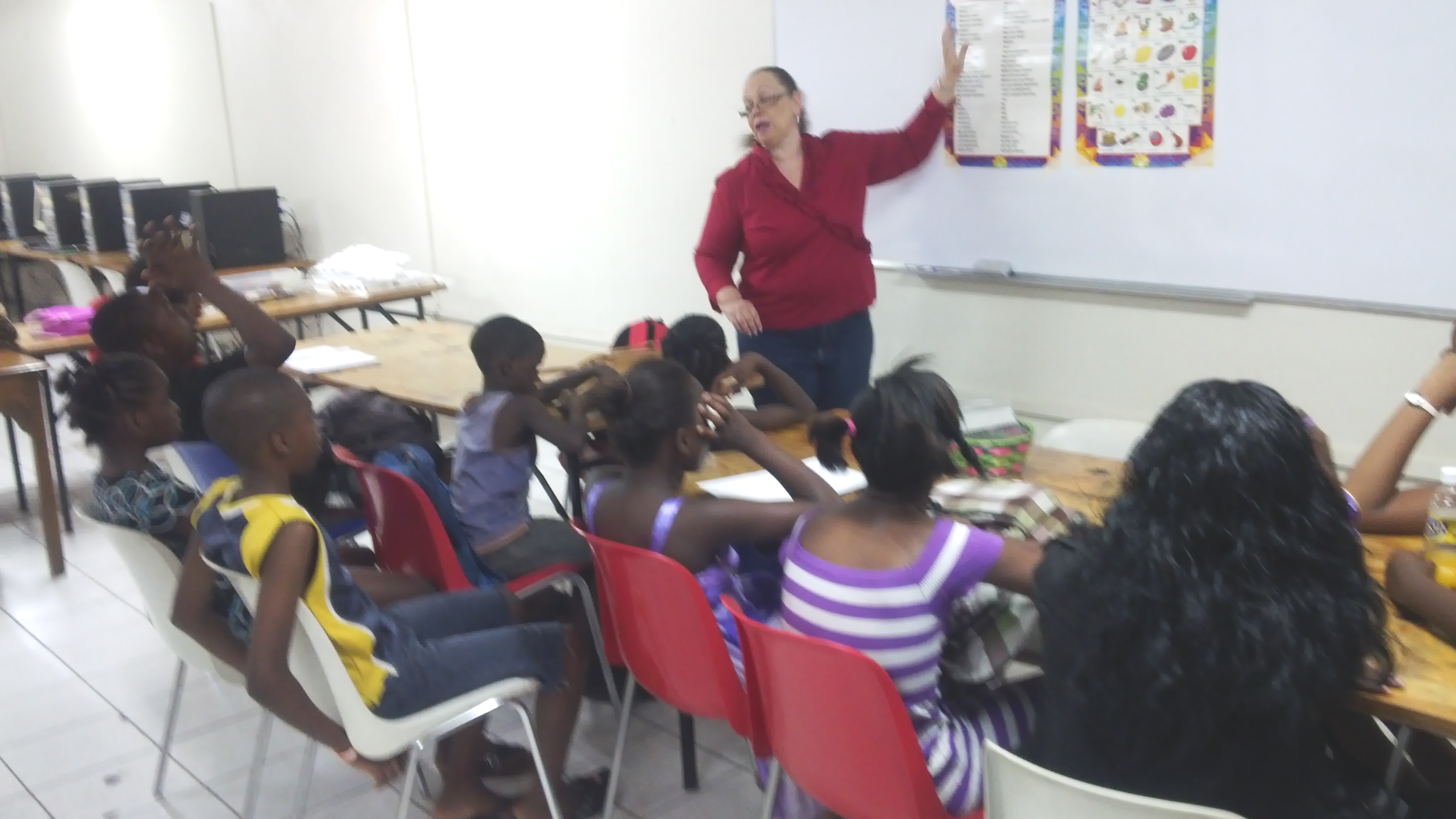 Senorita Charmaine Russell carries students through Spanish drills
