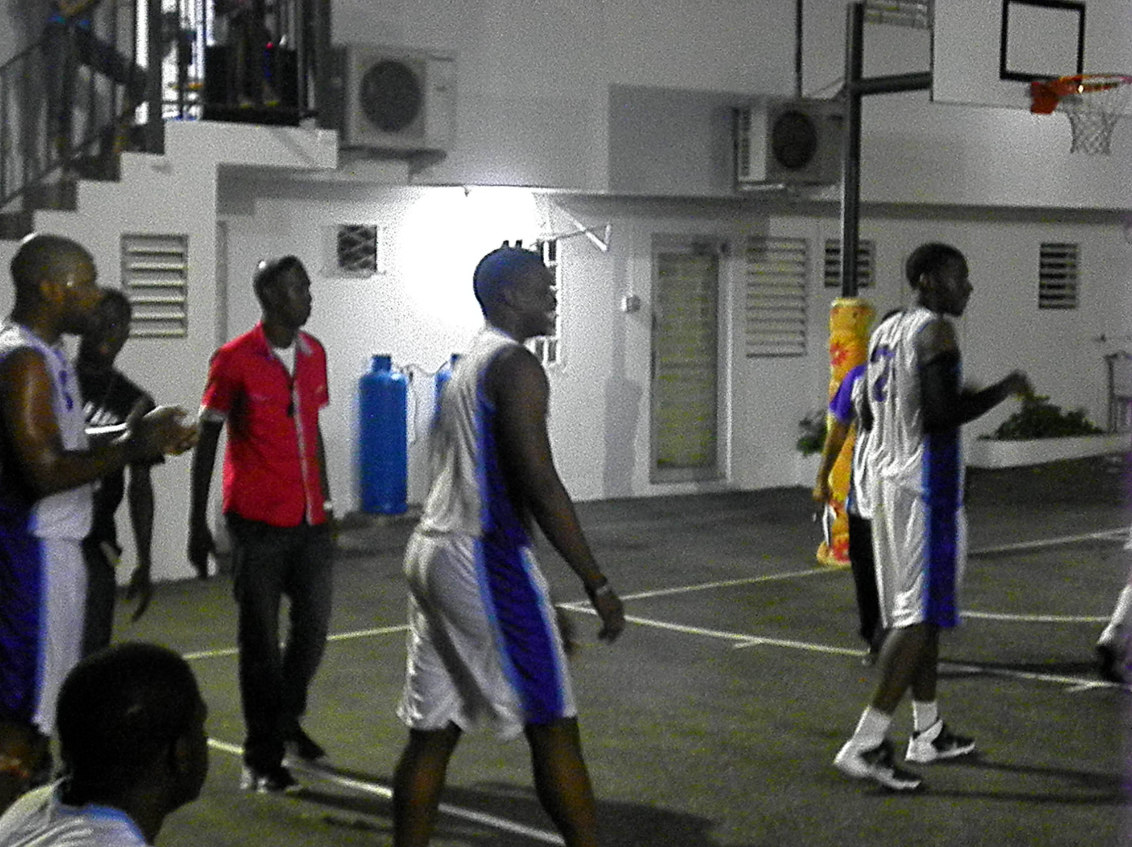 Coach Oneil gives tips from the side